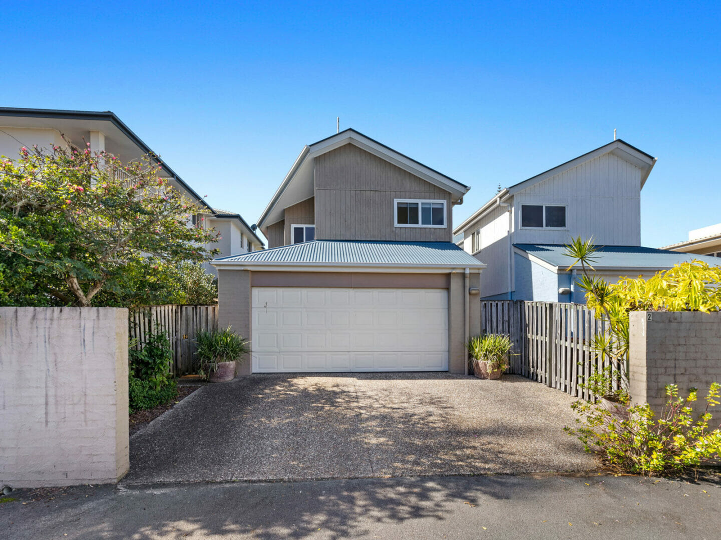 Two storey townhouse with lock up garage under and driveway