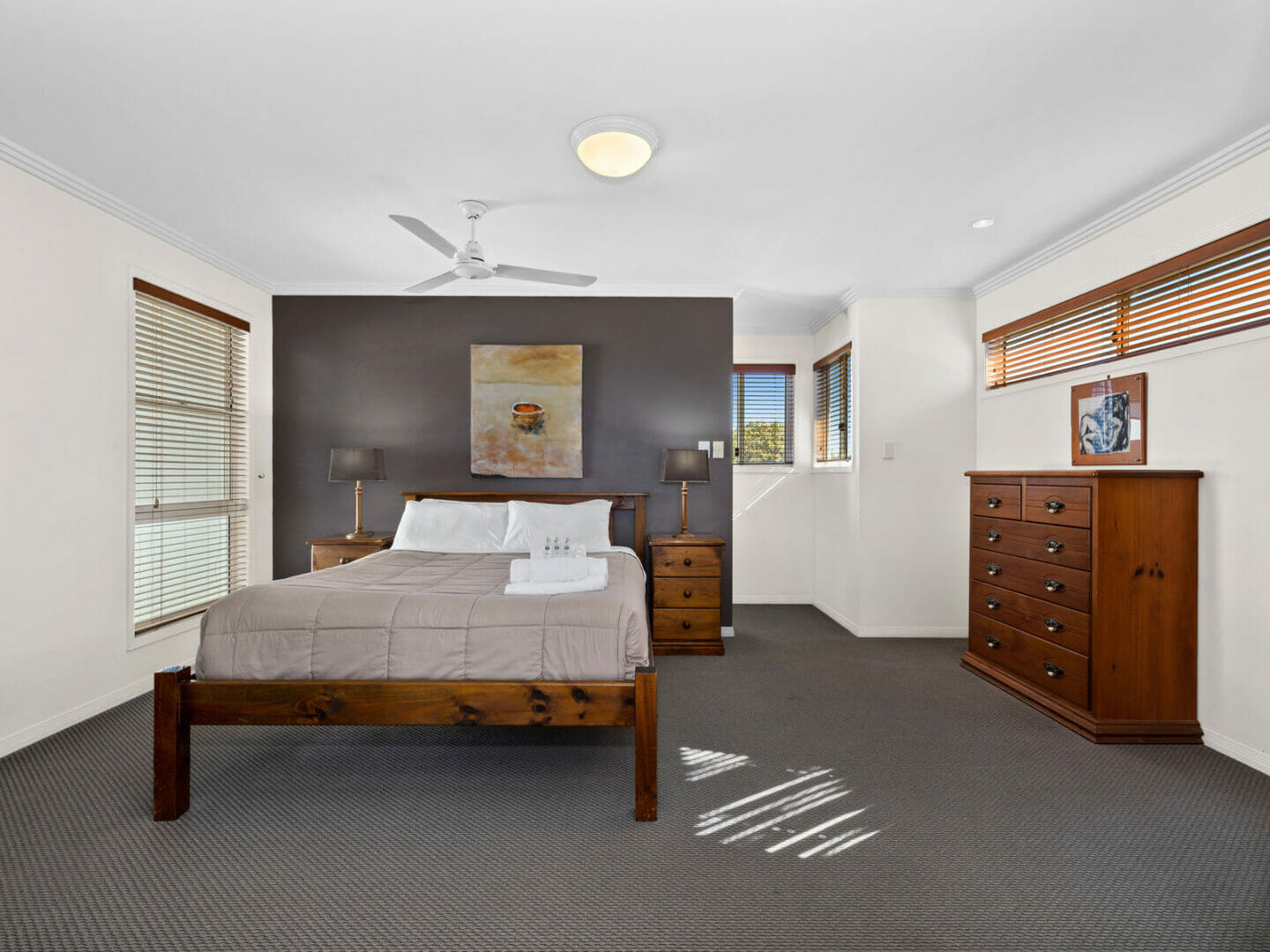 Bedroom with master bed and adjoining robe and ensuite