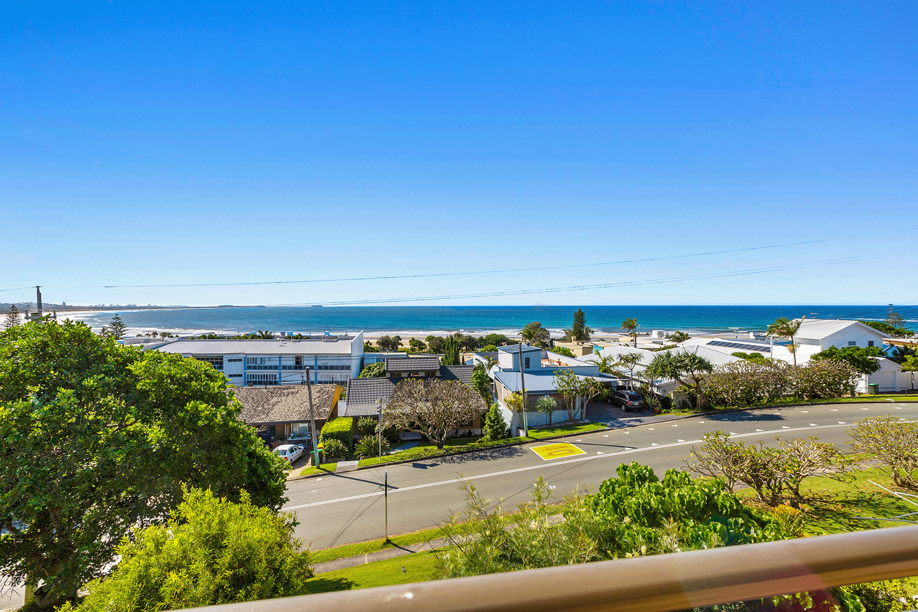 View of the ocean from the first floor apartment balcony
